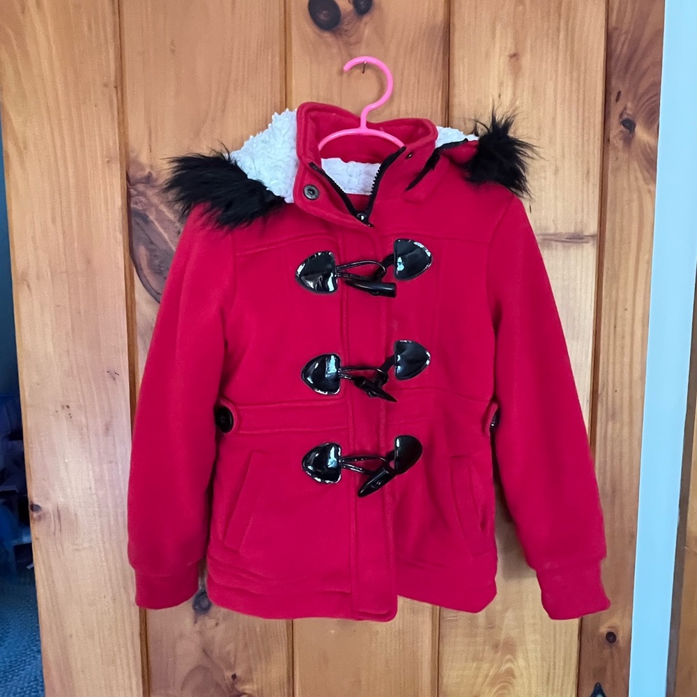 Little girl red fleece lined coat.